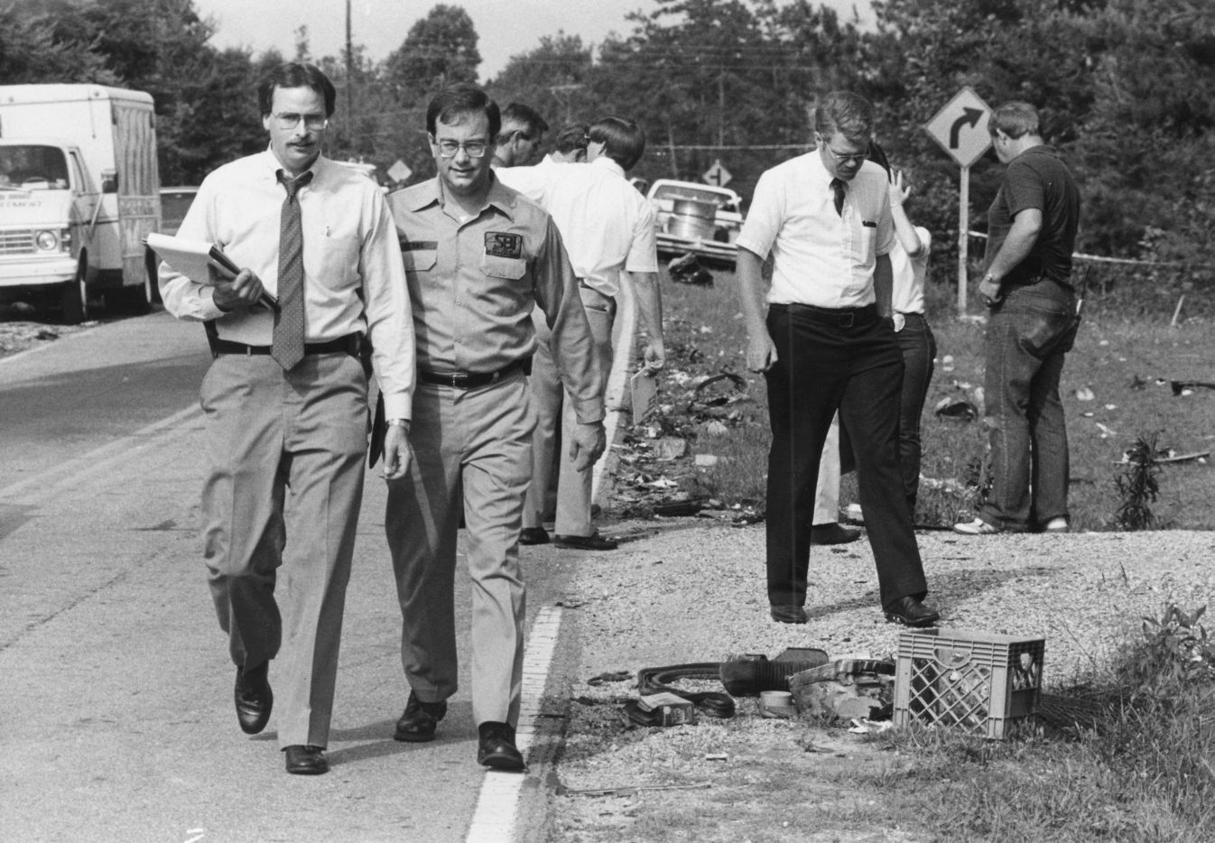 Investigators at scene of Blazer exposion